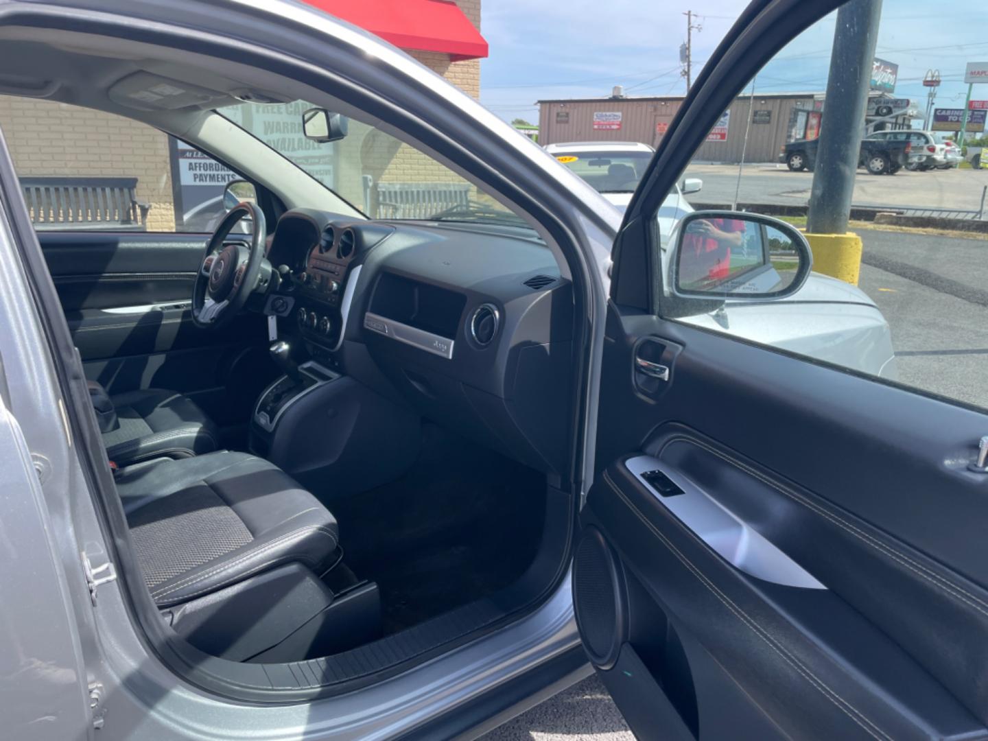 2016 Silver Jeep Compass (1C4NJCEA4GD) with an 4-Cyl, 2.0 Liter engine, Automatic, CVT transmission, located at 8008 Warden Rd, Sherwood, AR, 72120, (501) 801-6100, 34.830078, -92.186684 - Photo#8